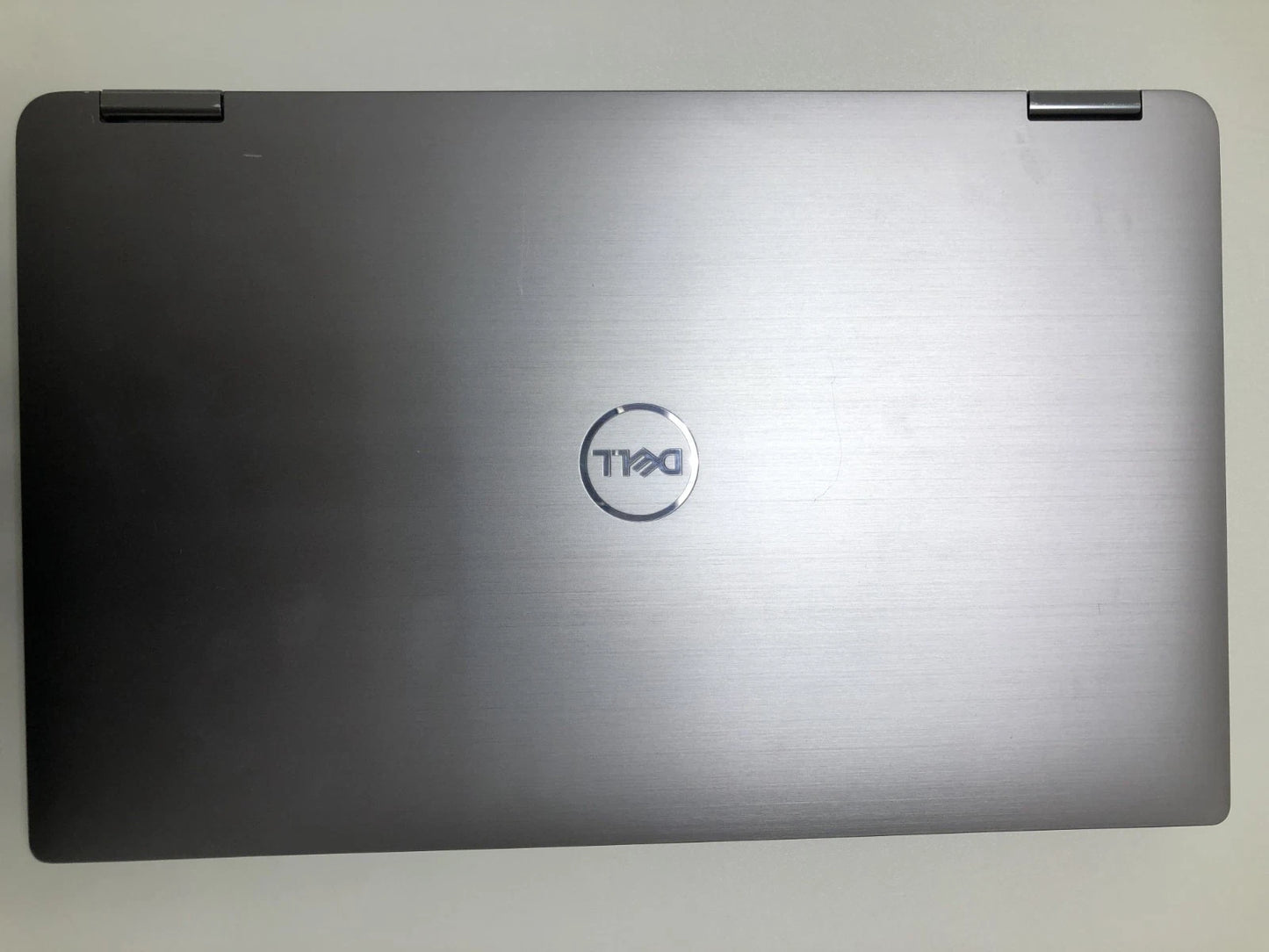 Dell Latitude 9410 laptop front view showing 14-inch display and thin design